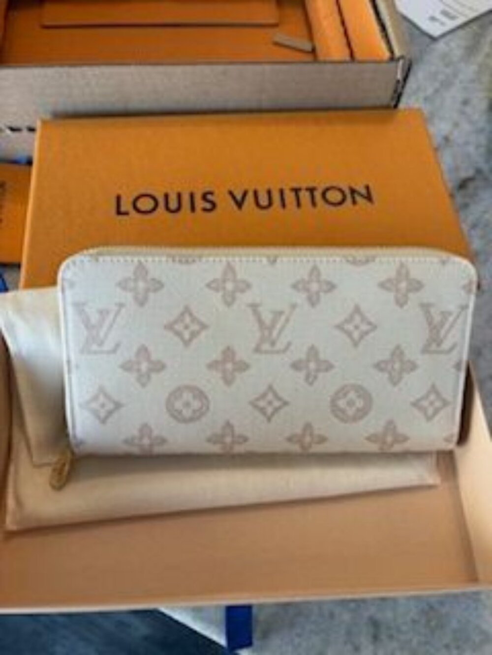 New, never used Authentic Louis Vuitton Monogram Origin Zippy Wallet Long